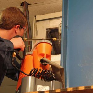 SpeedClean CJ-125 CoilJet, a portable HVAC coil cleaning system with a high-pressure spray and chemical injection, designed for thorough cleaning of evaporator and condenser coils.